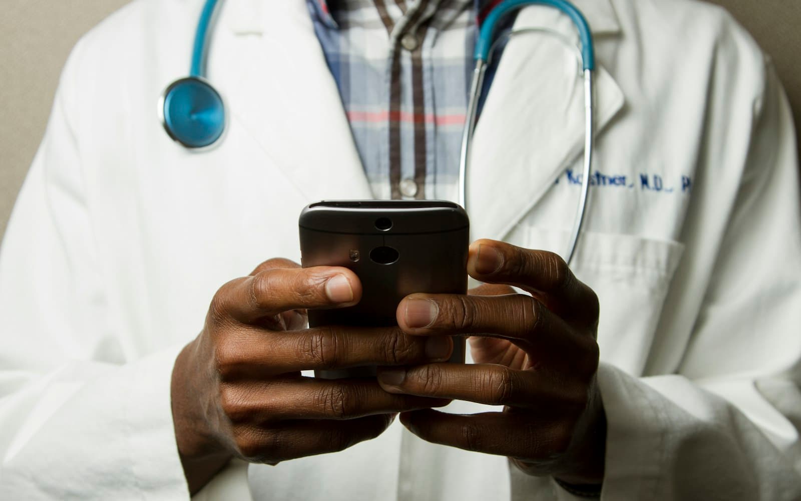 Doctor using a phone app